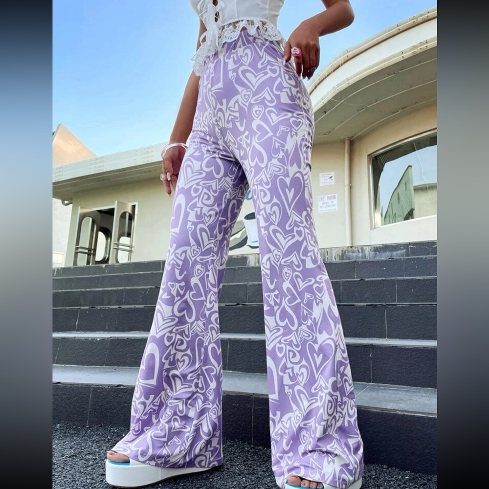 Purple and white colored design flare leggings